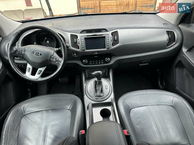 Коричневий Кіа Sportage, об'ємом двигуна 2 л та пробігом 197 тис. км за 14800 $, фото 17 на Automoto.ua