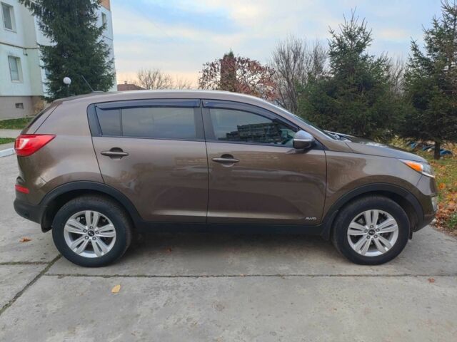 Коричневый Киа Sportage, объемом двигателя 2.4 л и пробегом 160 тыс. км за 11550 $, фото 18 на Automoto.ua