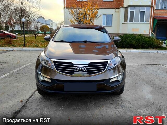 Коричневий Кіа Sportage, об'ємом двигуна 2.4 л та пробігом 160 тис. км за 11650 $, фото 2 на Automoto.ua