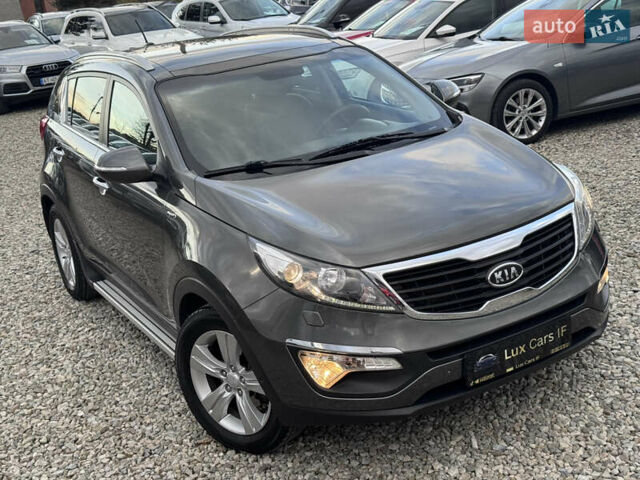 Коричневий Кіа Sportage, об'ємом двигуна 2 л та пробігом 190 тис. км за 13950 $, фото 28 на Automoto.ua