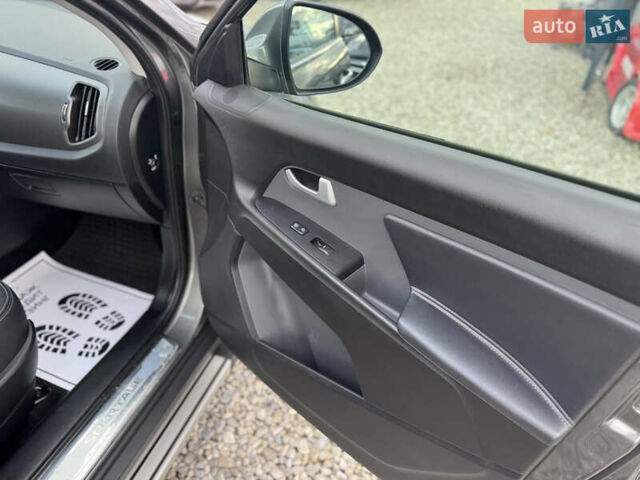 Коричневий Кіа Sportage, об'ємом двигуна 2 л та пробігом 190 тис. км за 13950 $, фото 59 на Automoto.ua