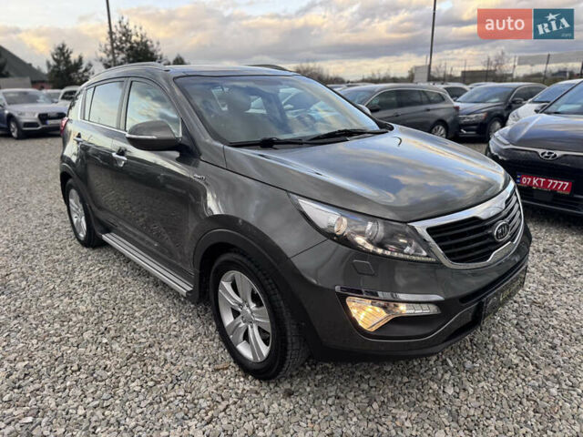 Коричневий Кіа Sportage, об'ємом двигуна 2 л та пробігом 190 тис. км за 13950 $, фото 23 на Automoto.ua