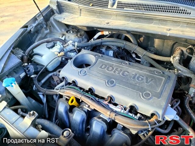 Коричневий Кіа Sportage, об'ємом двигуна 2.4 л та пробігом 160 тис. км за 11650 $, фото 11 на Automoto.ua