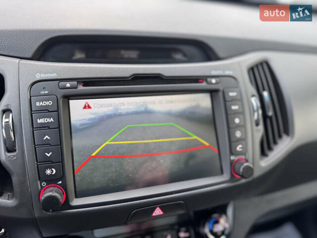 Коричневий Кіа Sportage, об'ємом двигуна 2 л та пробігом 190 тис. км за 13950 $, фото 40 на Automoto.ua