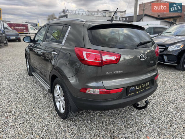 Коричневий Кіа Sportage, об'ємом двигуна 2 л та пробігом 190 тис. км за 13950 $, фото 11 на Automoto.ua