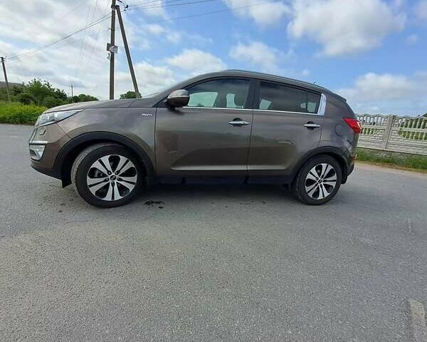 Коричневый Киа Sportage, объемом двигателя 2 л и пробегом 224 тыс. км за 14000 $, фото 2 на Automoto.ua