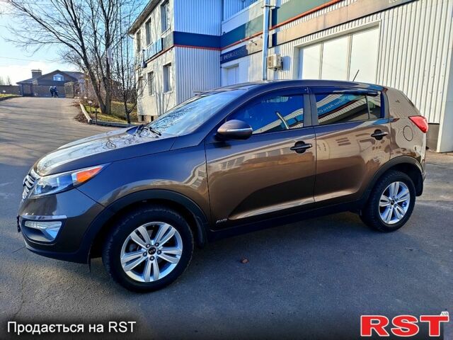 Коричневий Кіа Sportage, об'ємом двигуна 2.4 л та пробігом 160 тис. км за 11650 $, фото 2 на Automoto.ua