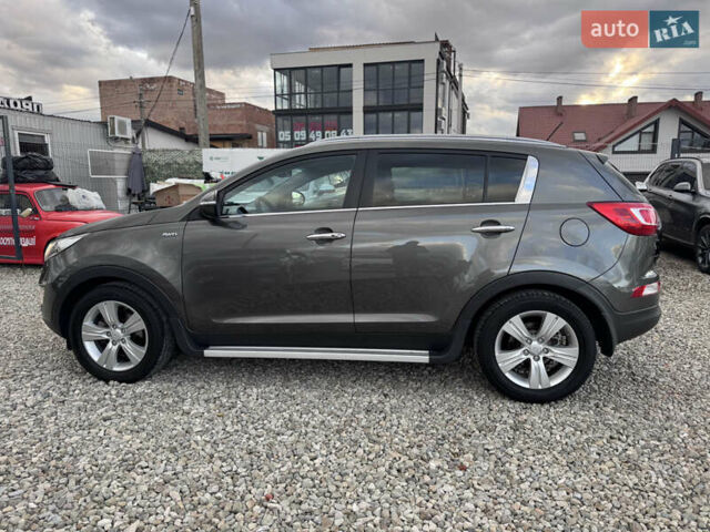 Коричневий Кіа Sportage, об'ємом двигуна 2 л та пробігом 190 тис. км за 13950 $, фото 6 на Automoto.ua