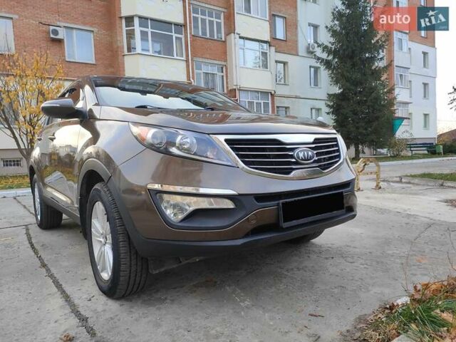Коричневый Киа Sportage, объемом двигателя 2.4 л и пробегом 164 тыс. км за 11750 $, фото 3 на Automoto.ua