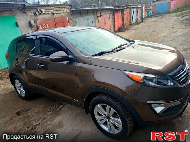 Коричневий Кіа Sportage, об'ємом двигуна 2.4 л та пробігом 160 тис. км за 11650 $, фото 1 на Automoto.ua