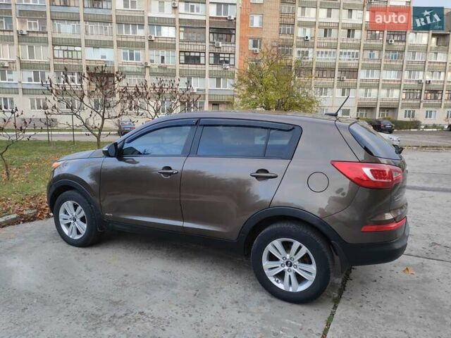 Коричневый Киа Sportage, объемом двигателя 2.4 л и пробегом 164 тыс. км за 11750 $, фото 2 на Automoto.ua