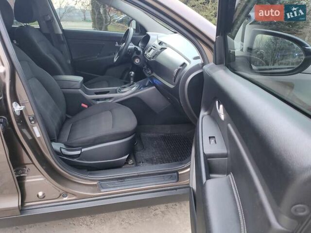Коричневый Киа Sportage, объемом двигателя 2.4 л и пробегом 164 тыс. км за 11550 $, фото 2 на Automoto.ua