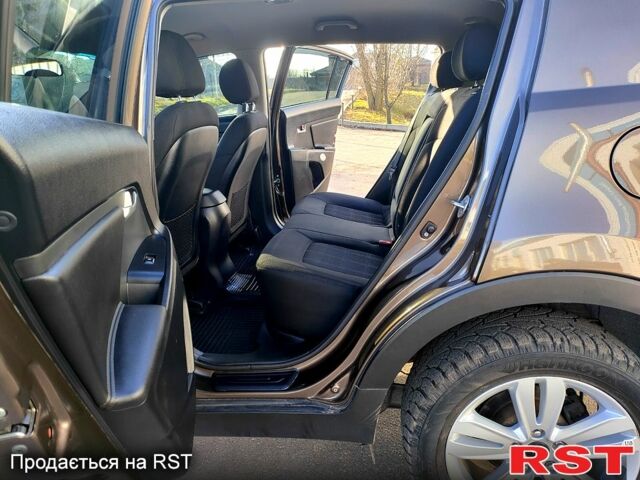 Коричневий Кіа Sportage, об'ємом двигуна 2.4 л та пробігом 160 тис. км за 11650 $, фото 4 на Automoto.ua