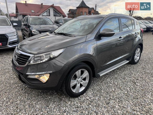 Коричневий Кіа Sportage, об'ємом двигуна 2 л та пробігом 190 тис. км за 13950 $, фото 4 на Automoto.ua