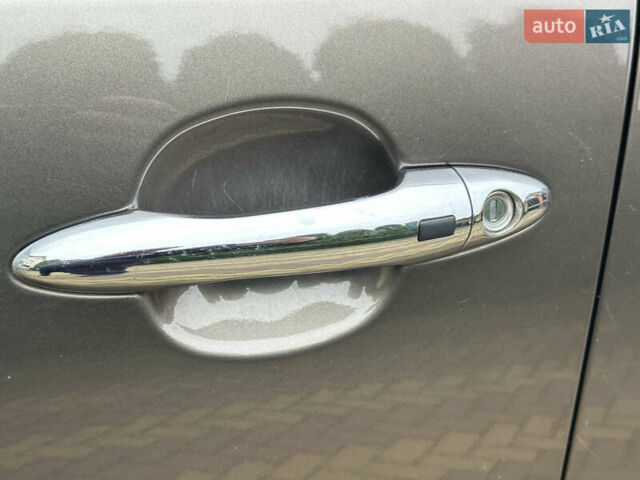 Коричневий Кіа Sportage, об'ємом двигуна 2 л та пробігом 197 тис. км за 14800 $, фото 25 на Automoto.ua