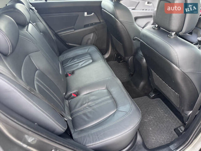 Коричневий Кіа Sportage, об'ємом двигуна 2 л та пробігом 190 тис. км за 13950 $, фото 57 на Automoto.ua