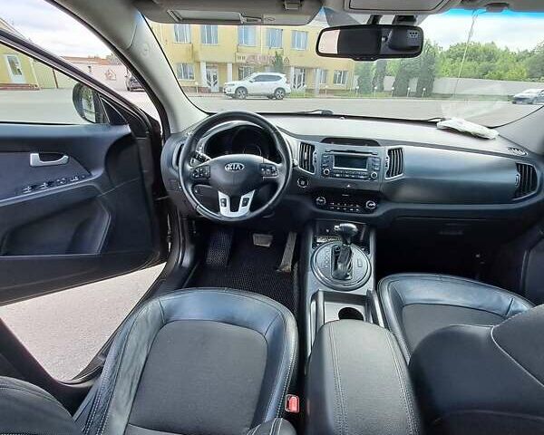 Коричневый Киа Sportage, объемом двигателя 2 л и пробегом 224 тыс. км за 14000 $, фото 1 на Automoto.ua