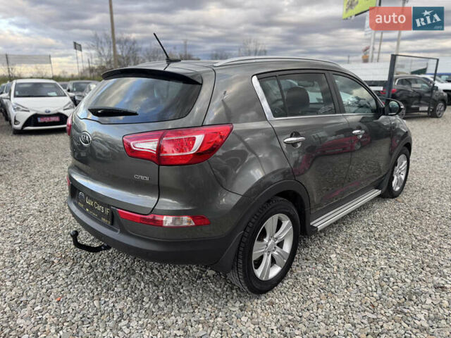 Коричневий Кіа Sportage, об'ємом двигуна 2 л та пробігом 190 тис. км за 13950 $, фото 18 на Automoto.ua