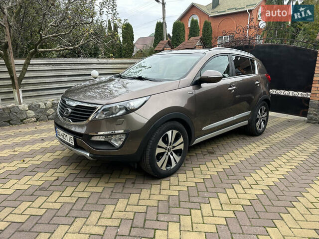 Коричневий Кіа Sportage, об'ємом двигуна 2 л та пробігом 197 тис. км за 14800 $, фото 7 на Automoto.ua