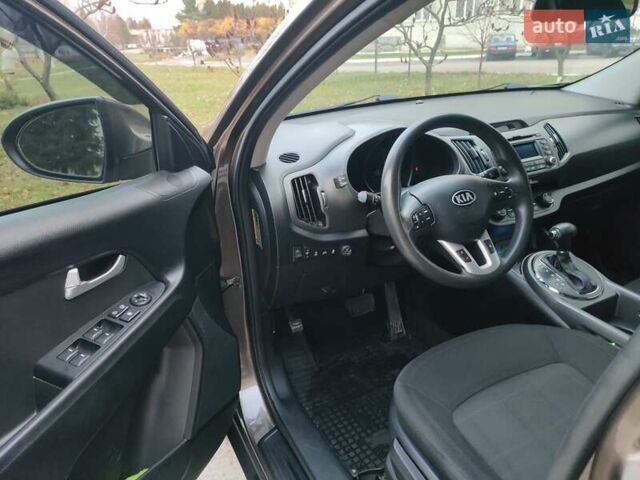 Коричневый Киа Sportage, объемом двигателя 2.4 л и пробегом 164 тыс. км за 11550 $, фото 1 на Automoto.ua