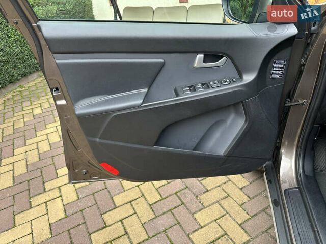 Коричневий Кіа Sportage, об'ємом двигуна 2 л та пробігом 197 тис. км за 14800 $, фото 21 на Automoto.ua