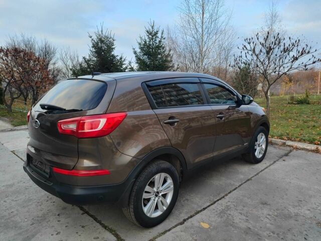 Коричневый Киа Sportage, объемом двигателя 2.4 л и пробегом 160 тыс. км за 11550 $, фото 2 на Automoto.ua