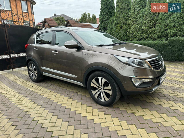 Коричневий Кіа Sportage, об'ємом двигуна 2 л та пробігом 197 тис. км за 14800 $, фото 1 на Automoto.ua