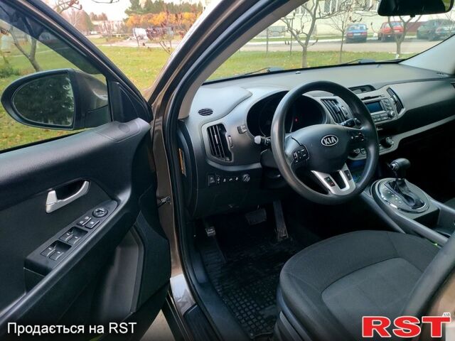 Коричневий Кіа Sportage, об'ємом двигуна 2.4 л та пробігом 160 тис. км за 11650 $, фото 7 на Automoto.ua