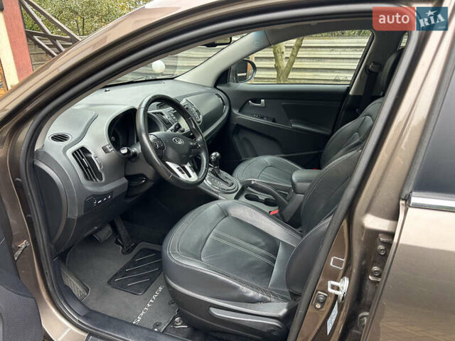 Коричневий Кіа Sportage, об'ємом двигуна 2 л та пробігом 197 тис. км за 14800 $, фото 13 на Automoto.ua