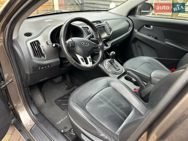 Коричневий Кіа Sportage, об'ємом двигуна 2 л та пробігом 197 тис. км за 14800 $, фото 12 на Automoto.ua