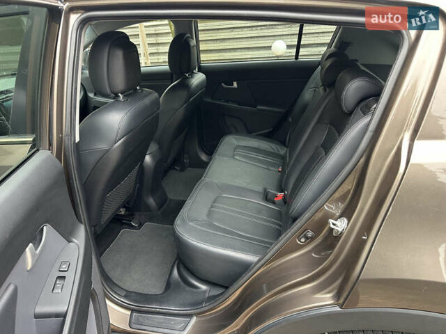 Коричневий Кіа Sportage, об'ємом двигуна 2 л та пробігом 197 тис. км за 14800 $, фото 24 на Automoto.ua