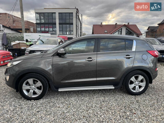 Коричневий Кіа Sportage, об'ємом двигуна 2 л та пробігом 190 тис. км за 13950 $, фото 5 на Automoto.ua