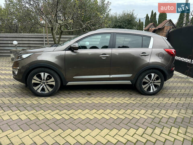 Коричневий Кіа Sportage, об'ємом двигуна 2 л та пробігом 197 тис. км за 14800 $, фото 9 на Automoto.ua
