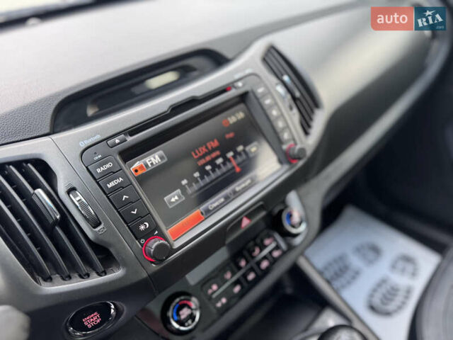 Коричневий Кіа Sportage, об'ємом двигуна 2 л та пробігом 190 тис. км за 13950 $, фото 35 на Automoto.ua