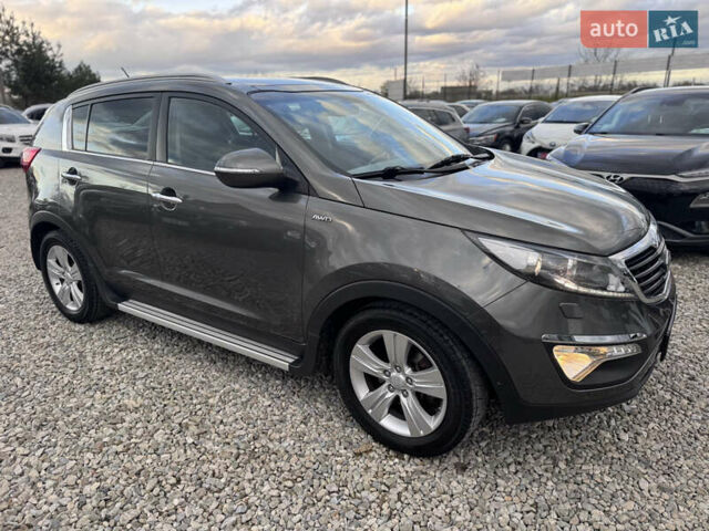 Коричневий Кіа Sportage, об'ємом двигуна 2 л та пробігом 190 тис. км за 13950 $, фото 22 на Automoto.ua