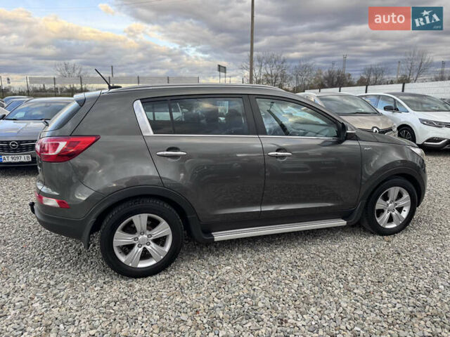 Коричневий Кіа Sportage, об'ємом двигуна 2 л та пробігом 190 тис. км за 13950 $, фото 20 на Automoto.ua