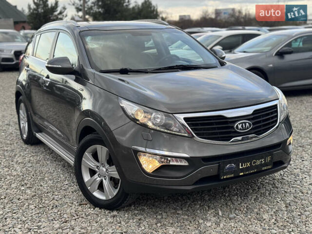 Коричневий Кіа Sportage, об'ємом двигуна 2 л та пробігом 190 тис. км за 13950 $, фото 30 на Automoto.ua