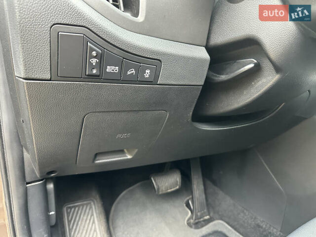 Коричневий Кіа Sportage, об'ємом двигуна 2 л та пробігом 197 тис. км за 14800 $, фото 18 на Automoto.ua