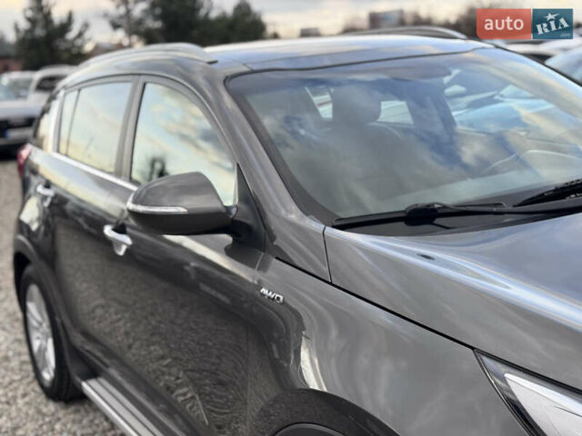 Коричневий Кіа Sportage, об'ємом двигуна 2 л та пробігом 190 тис. км за 13950 $, фото 25 на Automoto.ua