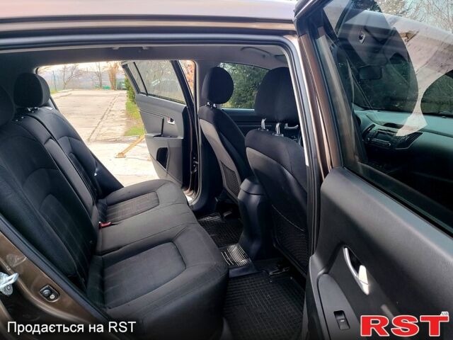 Коричневий Кіа Sportage, об'ємом двигуна 2.4 л та пробігом 160 тис. км за 11650 $, фото 5 на Automoto.ua