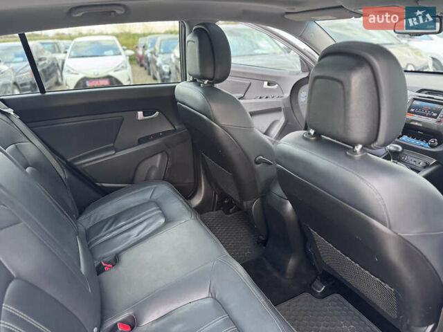 Коричневий Кіа Sportage, об'ємом двигуна 2 л та пробігом 190 тис. км за 13950 $, фото 58 на Automoto.ua