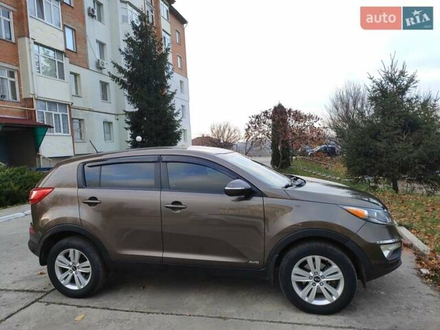 Коричневый Киа Sportage, объемом двигателя 2.4 л и пробегом 164 тыс. км за 11750 $, фото 22 на Automoto.ua