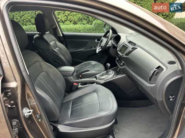 Коричневий Кіа Sportage, об'ємом двигуна 2 л та пробігом 197 тис. км за 14800 $, фото 16 на Automoto.ua