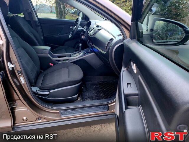 Коричневий Кіа Sportage, об'ємом двигуна 2.4 л та пробігом 160 тис. км за 11650 $, фото 4 на Automoto.ua