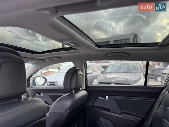 Коричневий Кіа Sportage, об'ємом двигуна 2 л та пробігом 190 тис. км за 13950 $, фото 52 на Automoto.ua