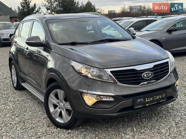 Коричневий Кіа Sportage, об'ємом двигуна 2 л та пробігом 190 тис. км за 13950 $, фото 29 на Automoto.ua