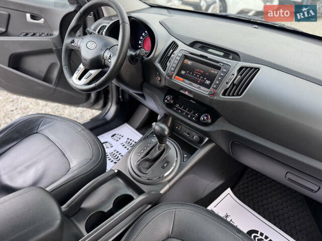 Коричневий Кіа Sportage, об'ємом двигуна 2 л та пробігом 190 тис. км за 13950 $, фото 62 на Automoto.ua