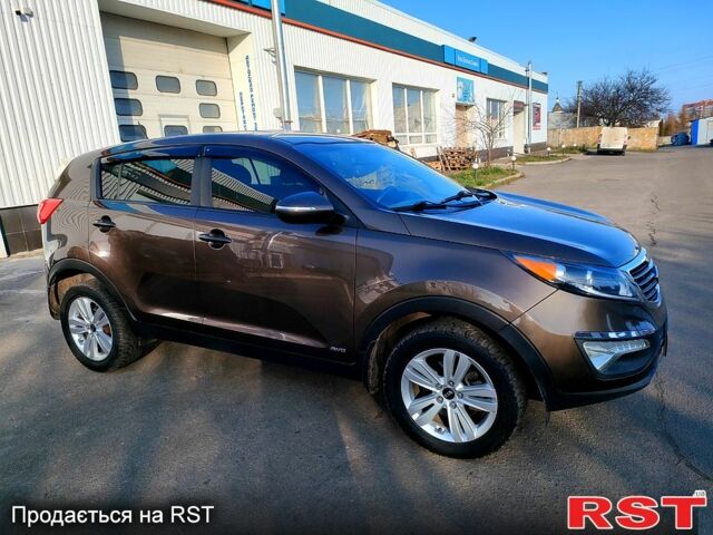 Коричневий Кіа Sportage, об'ємом двигуна 2.4 л та пробігом 160 тис. км за 11650 $, фото 13 на Automoto.ua
