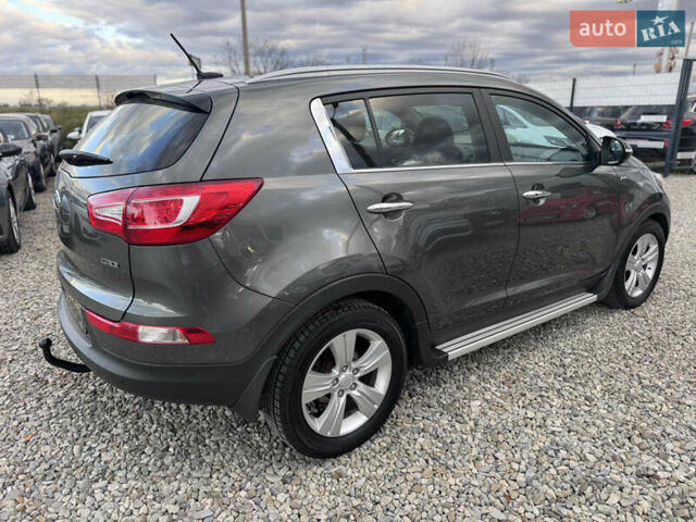 Коричневий Кіа Sportage, об'ємом двигуна 2 л та пробігом 190 тис. км за 13950 $, фото 19 на Automoto.ua