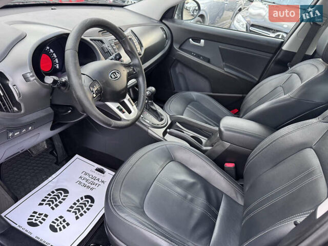 Коричневий Кіа Sportage, об'ємом двигуна 2 л та пробігом 190 тис. км за 13950 $, фото 45 на Automoto.ua